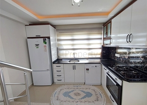 Двухэтажная квартира с мебелью в Махмутларе 