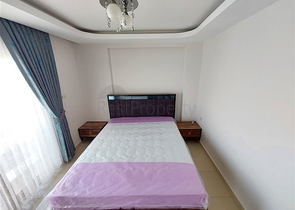 Двухэтажная квартира с мебелью в Махмутларе 