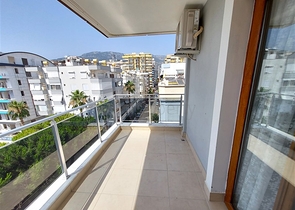 Двухэтажная квартира с мебелью в Махмутларе 