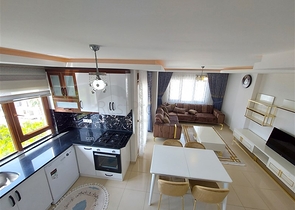 Двухэтажная квартира с мебелью в Махмутларе 