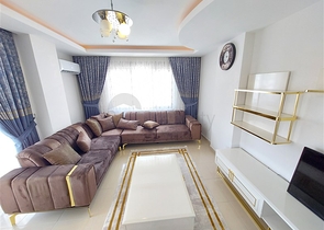 Двухэтажная квартира с мебелью в Махмутларе 