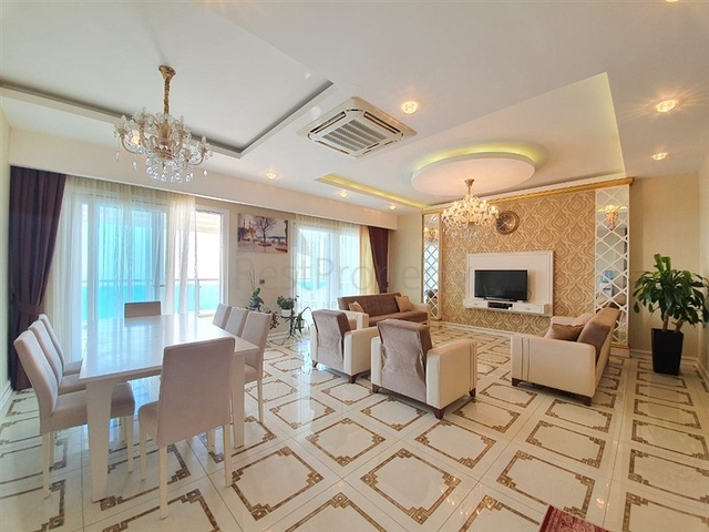 Меблированный двухуровневый пентхаус в Махмутларе