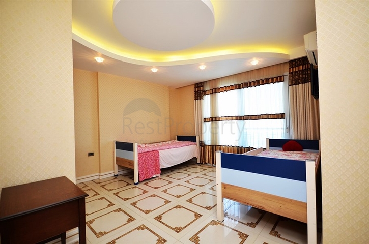 Меблированный двухуровневый пентхаус в Махмутларе