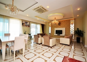 Меблированный двухуровневый пентхаус в Махмутларе