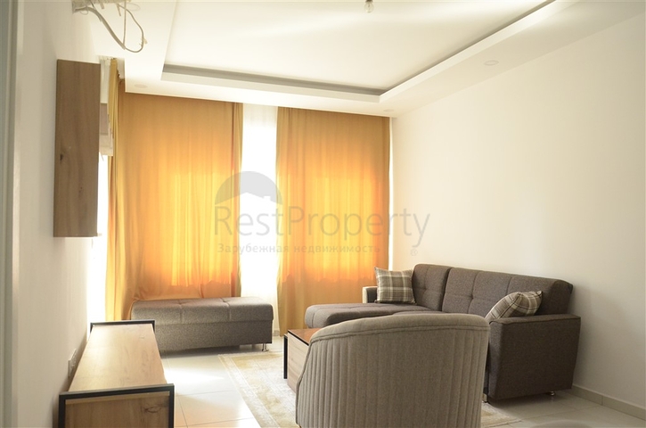 Квартира 1+1 с мебелью в районе Махмутлар