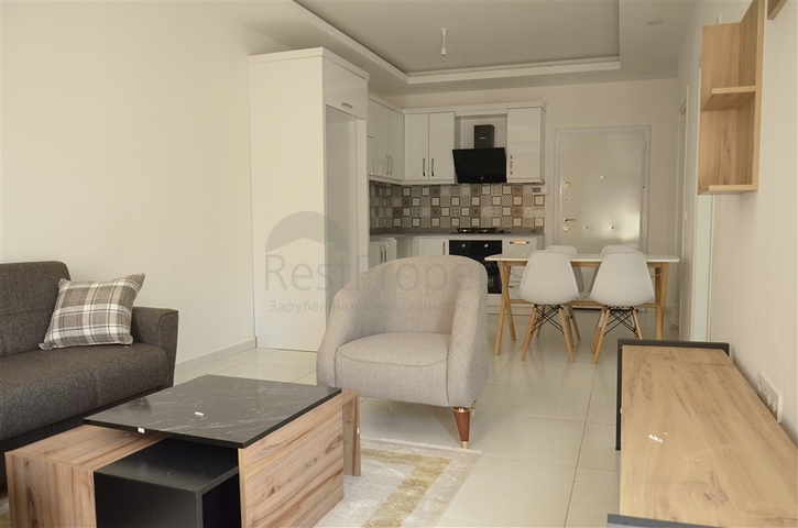 Квартира 1+1 с мебелью в районе Махмутлар