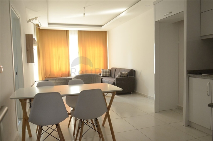 Квартира 1+1 с мебелью в районе Махмутлар