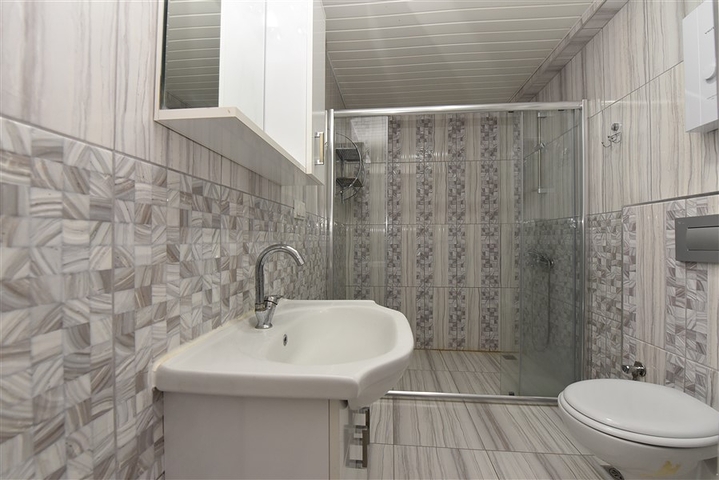 Двухкомнатная  квартира в русскоязычном районе Махмутлар