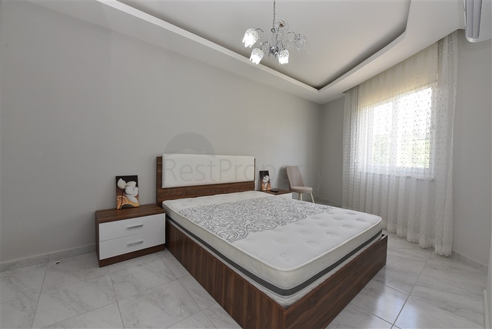 Двухкомнатная  квартира в русскоязычном районе Махмутлар