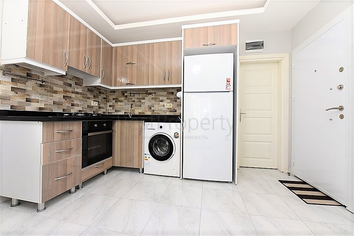 Двухкомнатная  квартира в русскоязычном районе Махмутлар