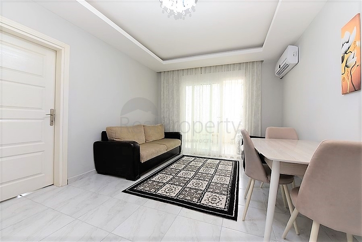 Двухкомнатная  квартира в русскоязычном районе Махмутлар