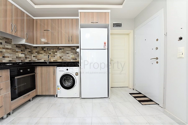 Двухкомнатная  квартира в русскоязычном районе Махмутлар