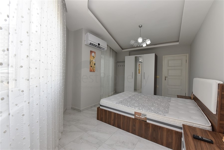 Двухкомнатная  квартира в русскоязычном районе Махмутлар