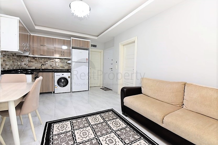 Двухкомнатная  квартира в русскоязычном районе Махмутлар