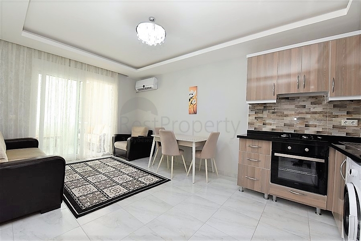 Двухкомнатная  квартира в русскоязычном районе Махмутлар