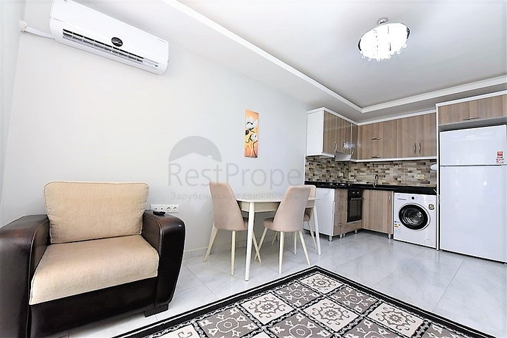 Двухкомнатная  квартира в русскоязычном районе Махмутлар