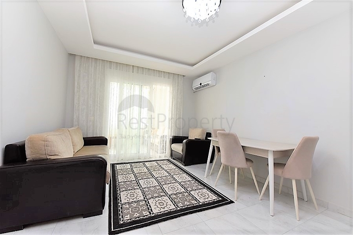 Двухкомнатная  квартира в русскоязычном районе Махмутлар