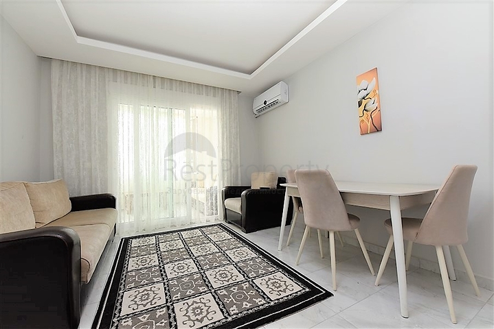 Двухкомнатная  квартира в русскоязычном районе Махмутлар