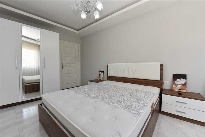 Двухкомнатная  квартира в русскоязычном районе Махмутлар