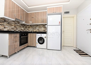 Двухкомнатная  квартира в русскоязычном районе Махмутлар