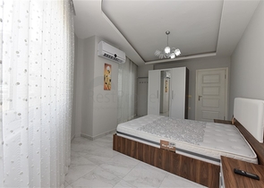 Двухкомнатная  квартира в русскоязычном районе Махмутлар