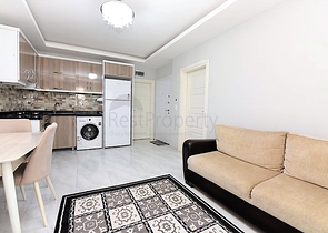 Двухкомнатная  квартира в русскоязычном районе Махмутлар