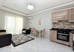 Двухкомнатная  квартира в русскоязычном районе Махмутлар