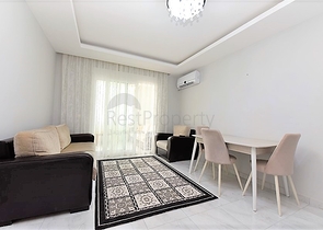 Двухкомнатная  квартира в русскоязычном районе Махмутлар