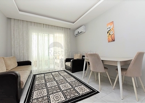 Двухкомнатная  квартира в русскоязычном районе Махмутлар