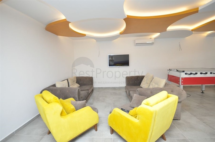 Двухкомнатная квартира в районе Махмутлар