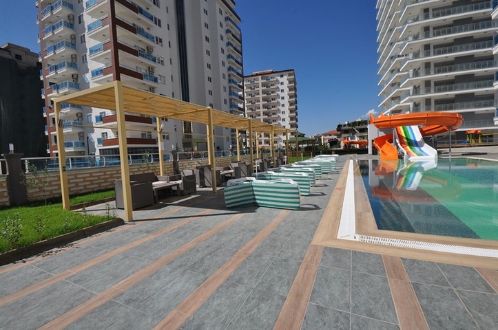 Двухкомнатная квартира в районе Махмутлар