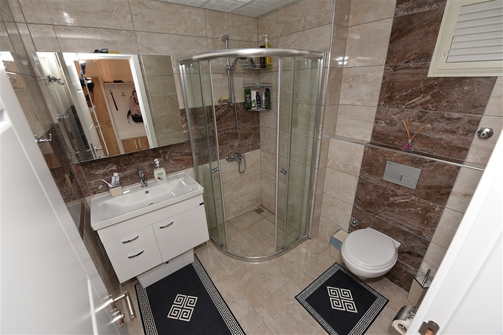 Двухкомнатная квартира в районе Махмутлар