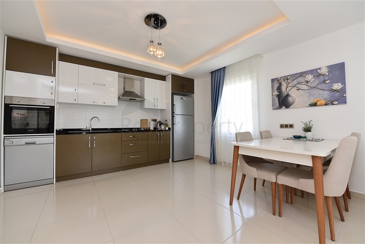 Двухкомнатная квартира в районе Махмутлар