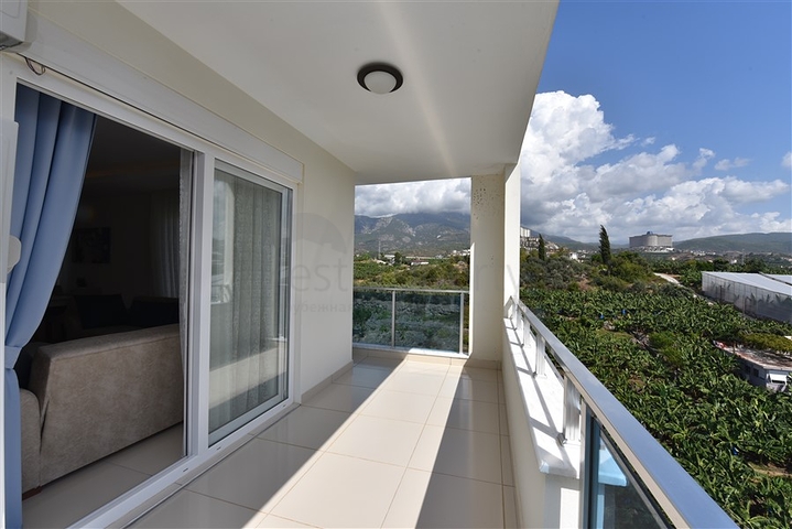 Двухкомнатная квартира в районе Махмутлар