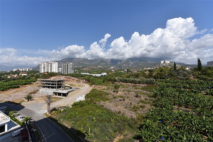 Двухкомнатная квартира в районе Махмутлар