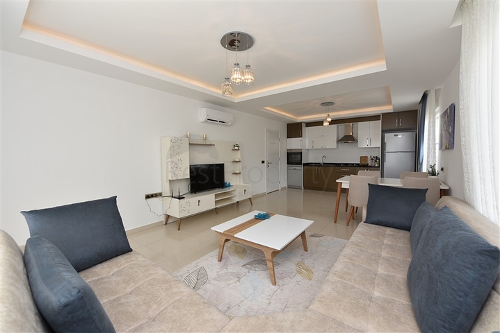 Двухкомнатная квартира в районе Махмутлар