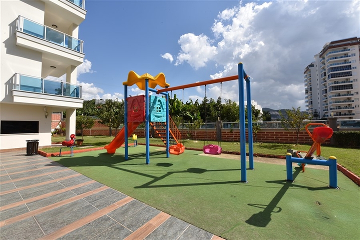 Двухкомнатная квартира в районе Махмутлар