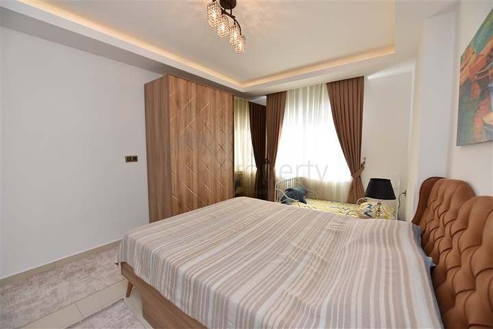 Двухкомнатная квартира в районе Махмутлар