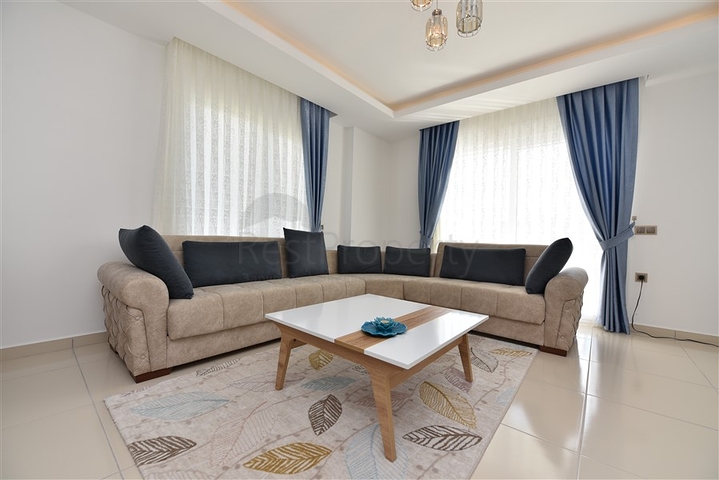 Двухкомнатная квартира в районе Махмутлар