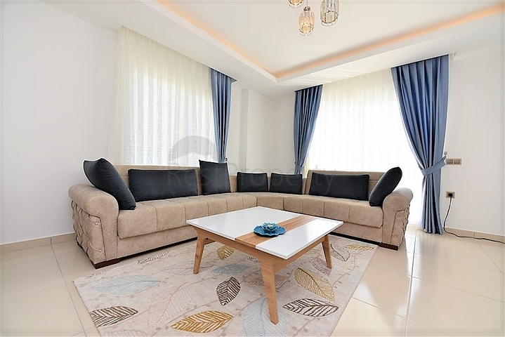 Двухкомнатная квартира в районе Махмутлар