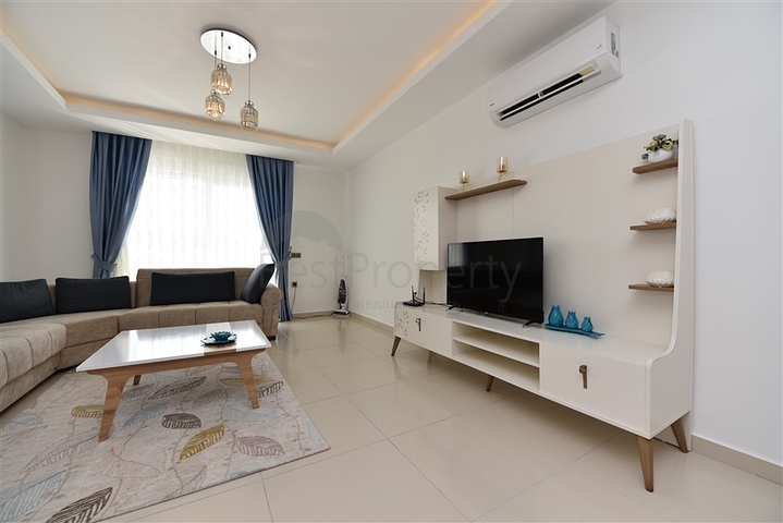 Двухкомнатная квартира в районе Махмутлар