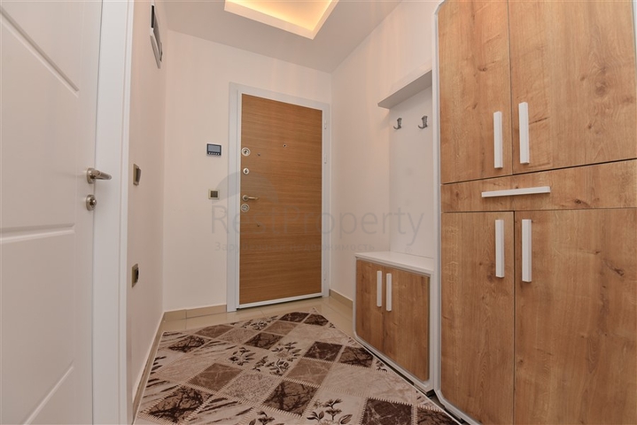 Двухкомнатная квартира в районе Махмутлар