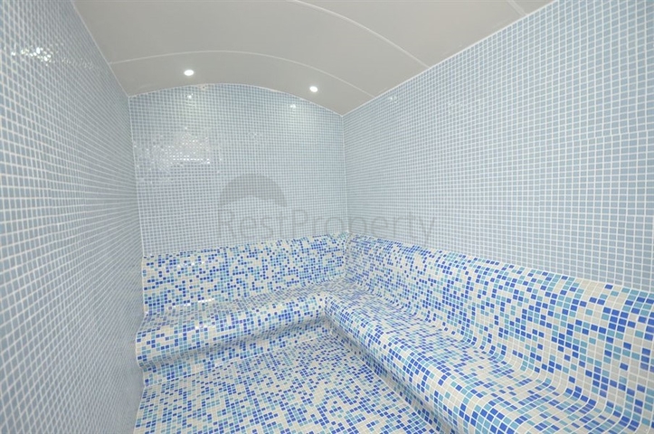 Двухкомнатная квартира в районе Махмутлар