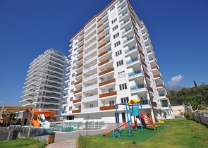 Двухкомнатная квартира в районе Махмутлар