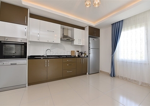 Двухкомнатная квартира в районе Махмутлар