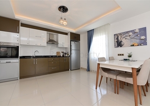 Двухкомнатная квартира в районе Махмутлар