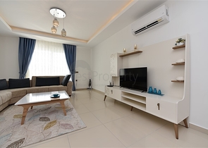 Двухкомнатная квартира в районе Махмутлар