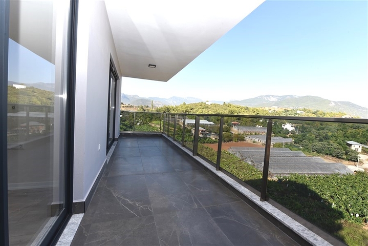 Апартаменты планировкой 2+1 в районе Тосмур