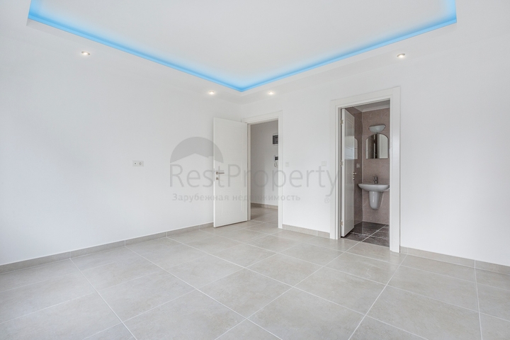 Квартира планировкой 2+1 в новом доме в Махмутларе