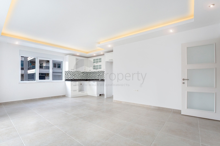 Квартира планировкой 2+1 в новом доме в Махмутларе